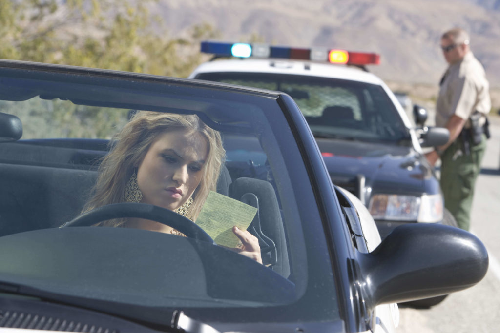 Girl Receives Traffic Violation